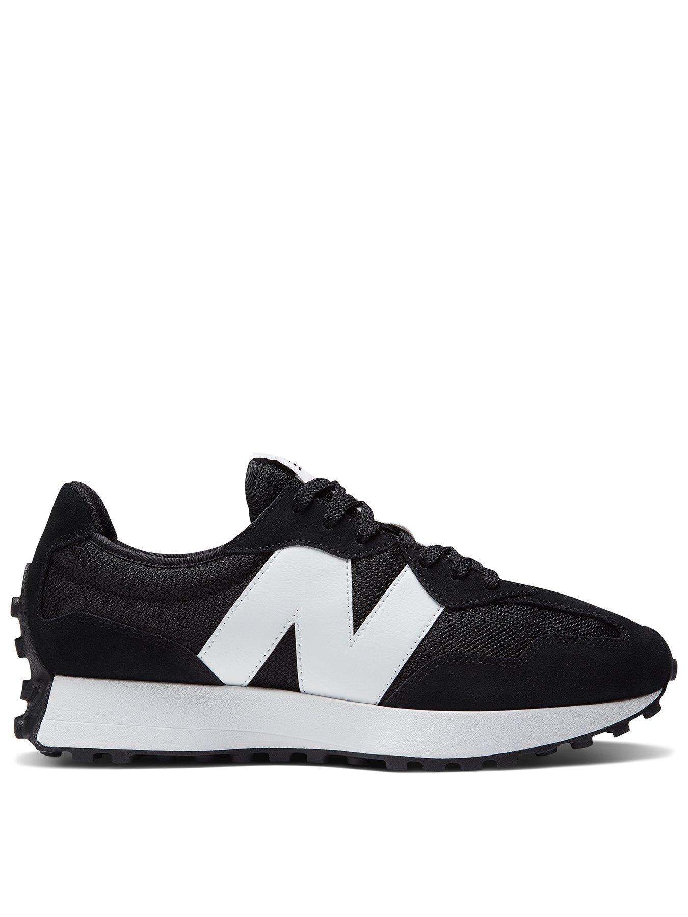 Womens black best sale new balance sneakers