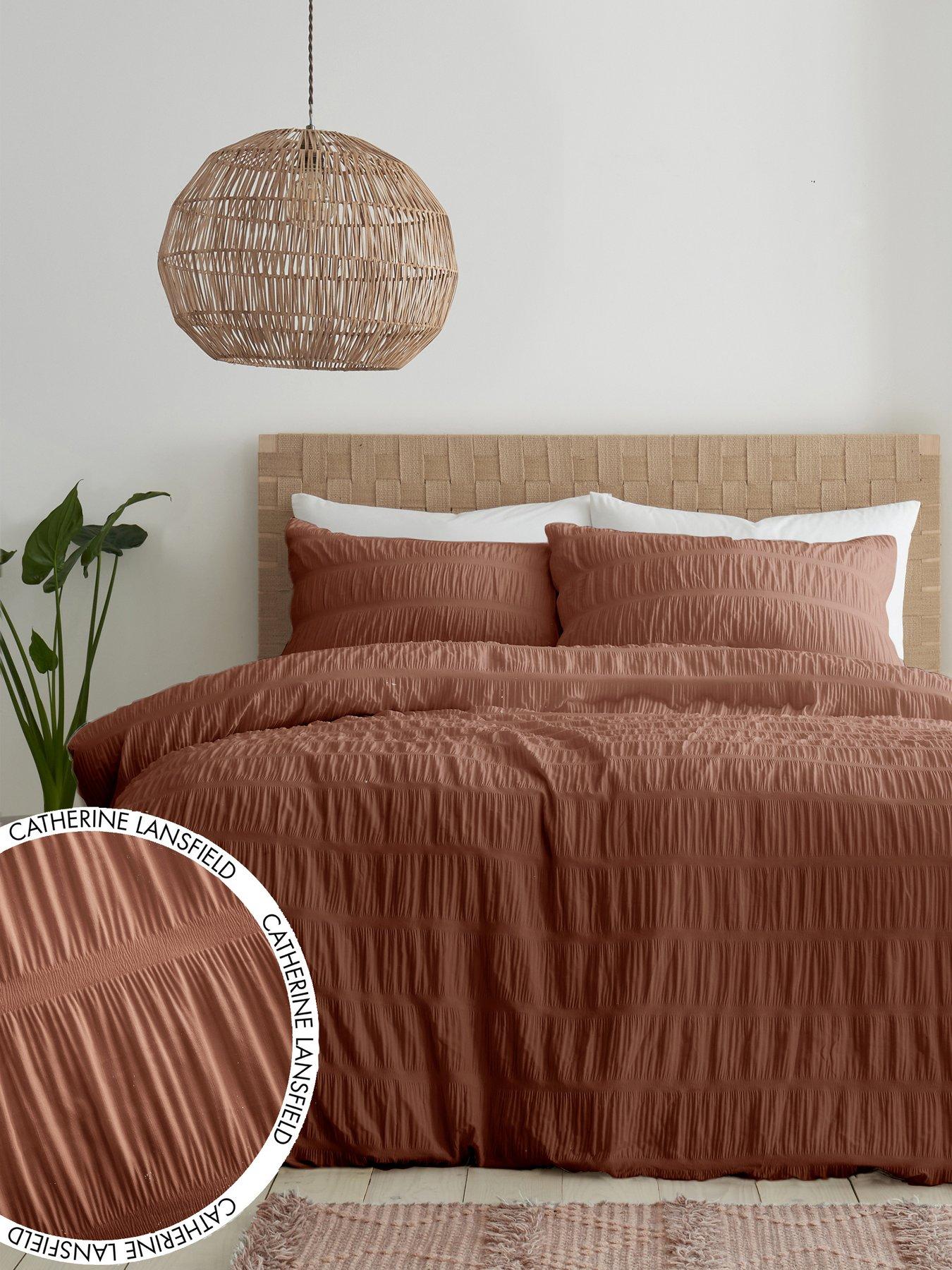 Product photograph of Catherine Lansfield Terracotta Seersucker Duvet Cover Set from very.co.uk