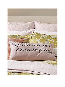Product photograph of Ted Baker Wake Me For Champagne Cushion - Pink from very.co.uk
