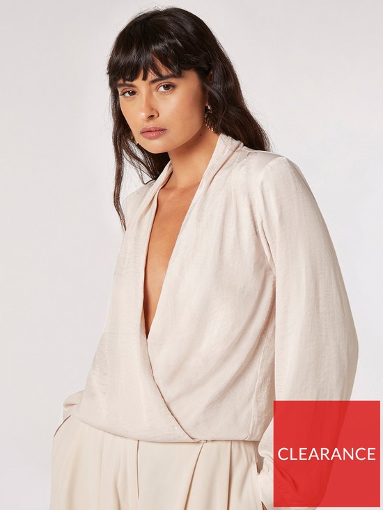 front image of apricot-textured-satin-wrap-blouse