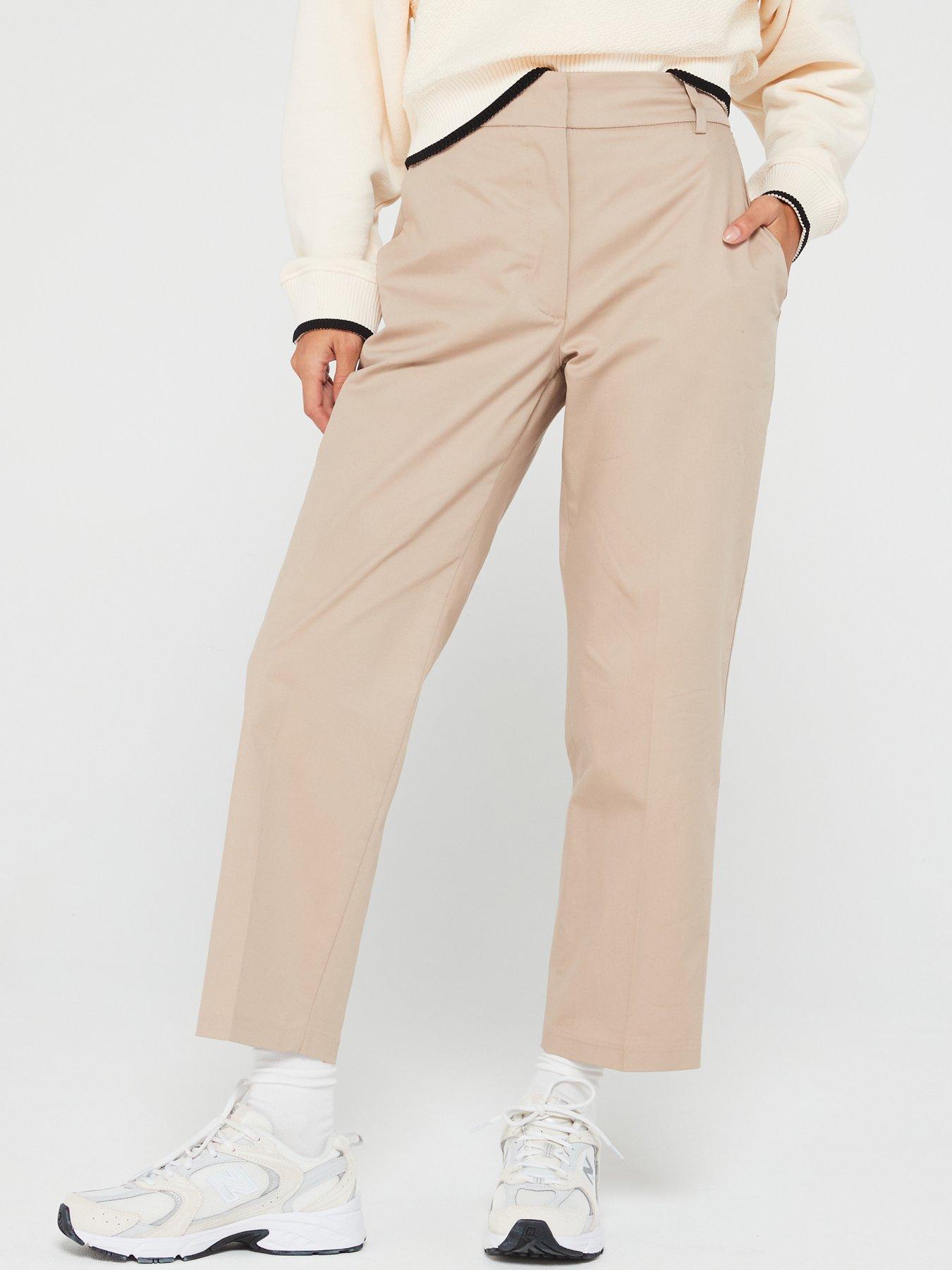 7,700+ Beige Pants For Women Stock Photos, Pictures & Royalty-Free Images -  iStock