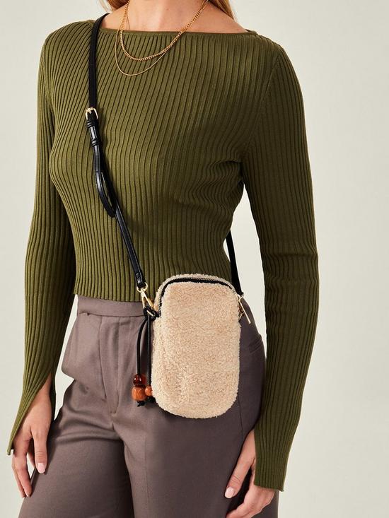 stillFront image of accessorize-shearling-phone-bag