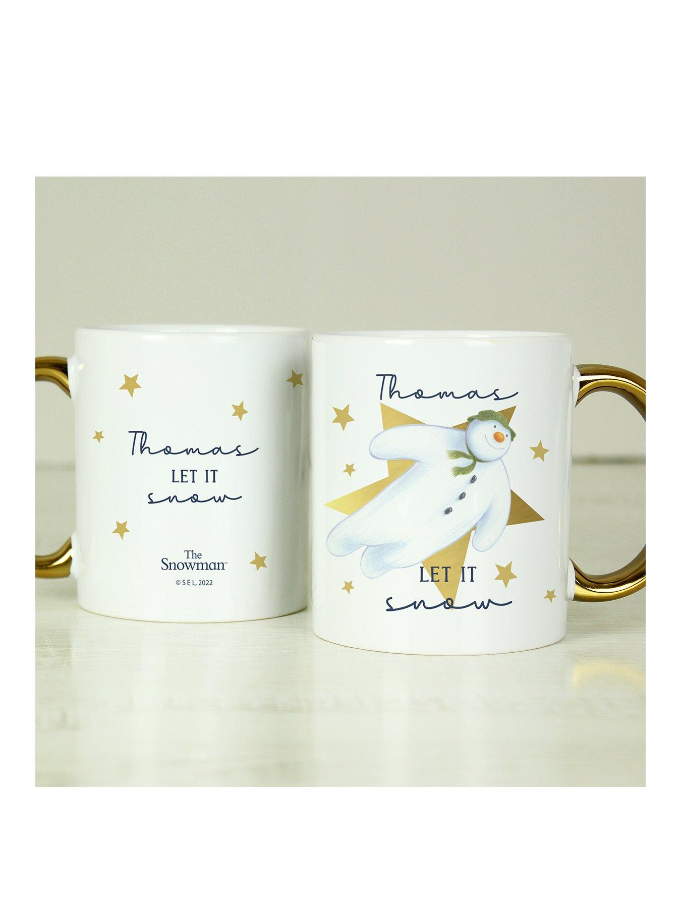 Product photograph of The Personalised Memento Company Personalised The Snowman Let It Snow Gold Handed Mug from very.co.uk