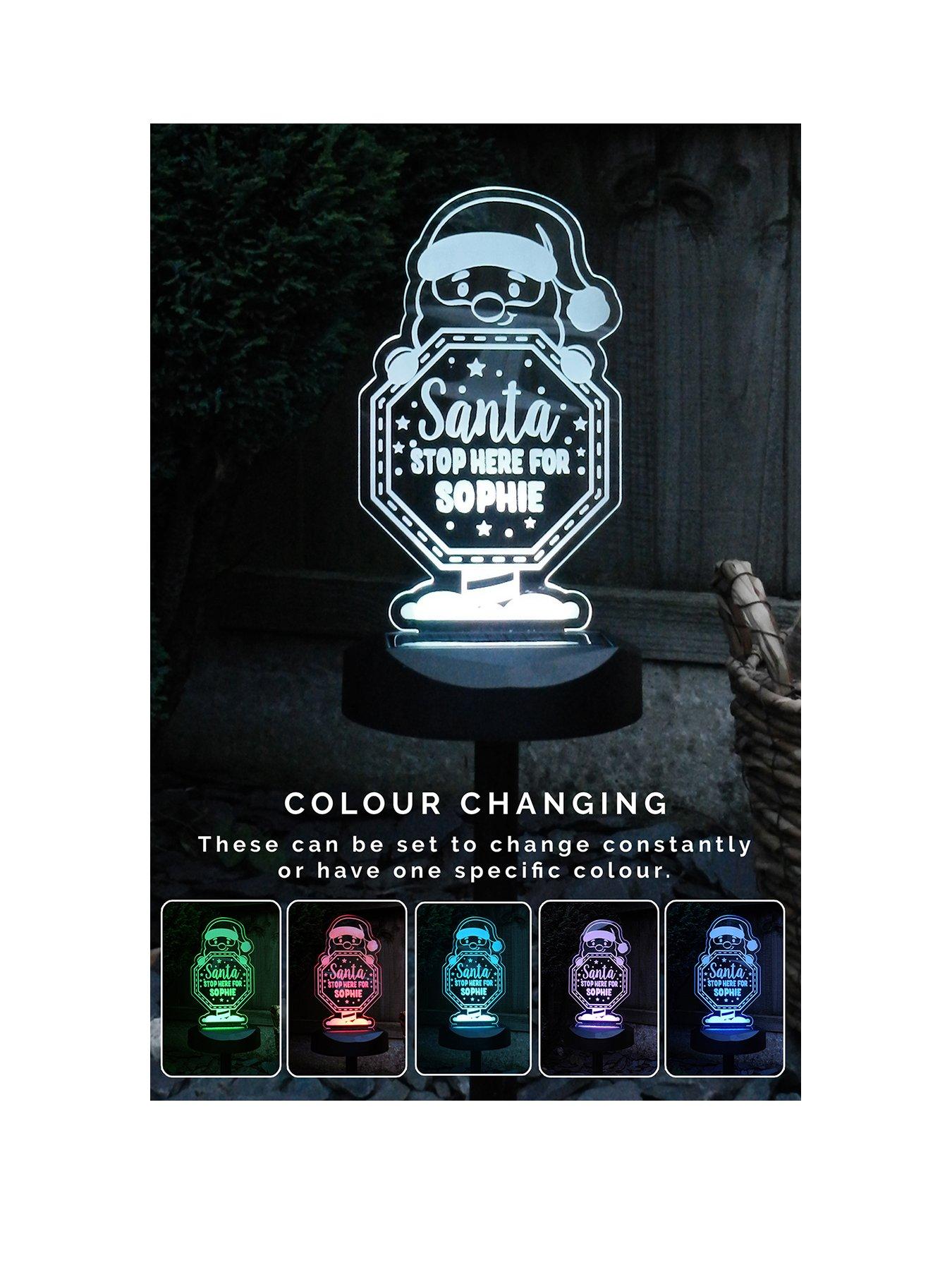 Product photograph of The Personalised Memento Company Personalised Outdoor Solar Santa Stop Here Light from very.co.uk