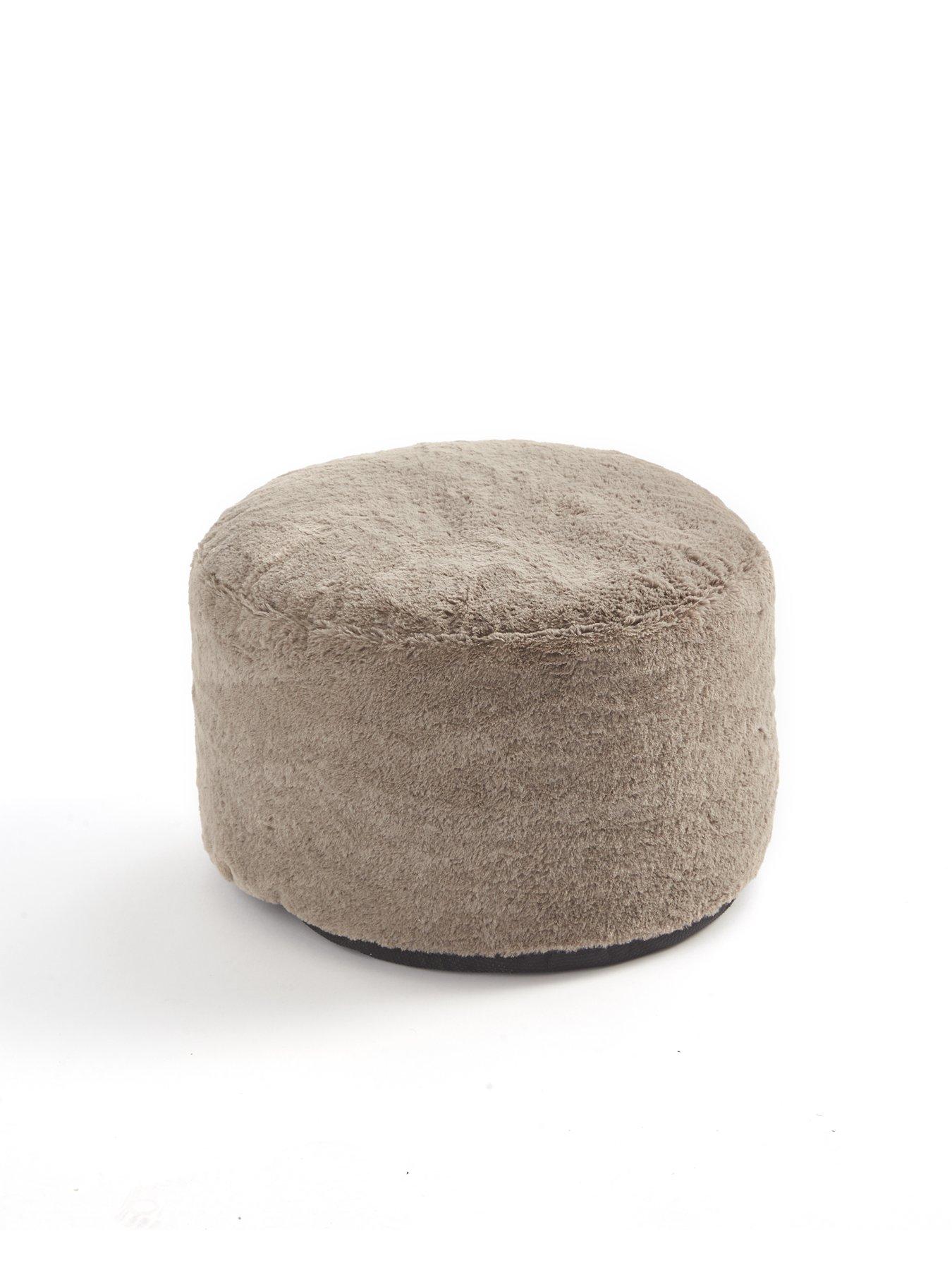 Round faux deals fur ottoman