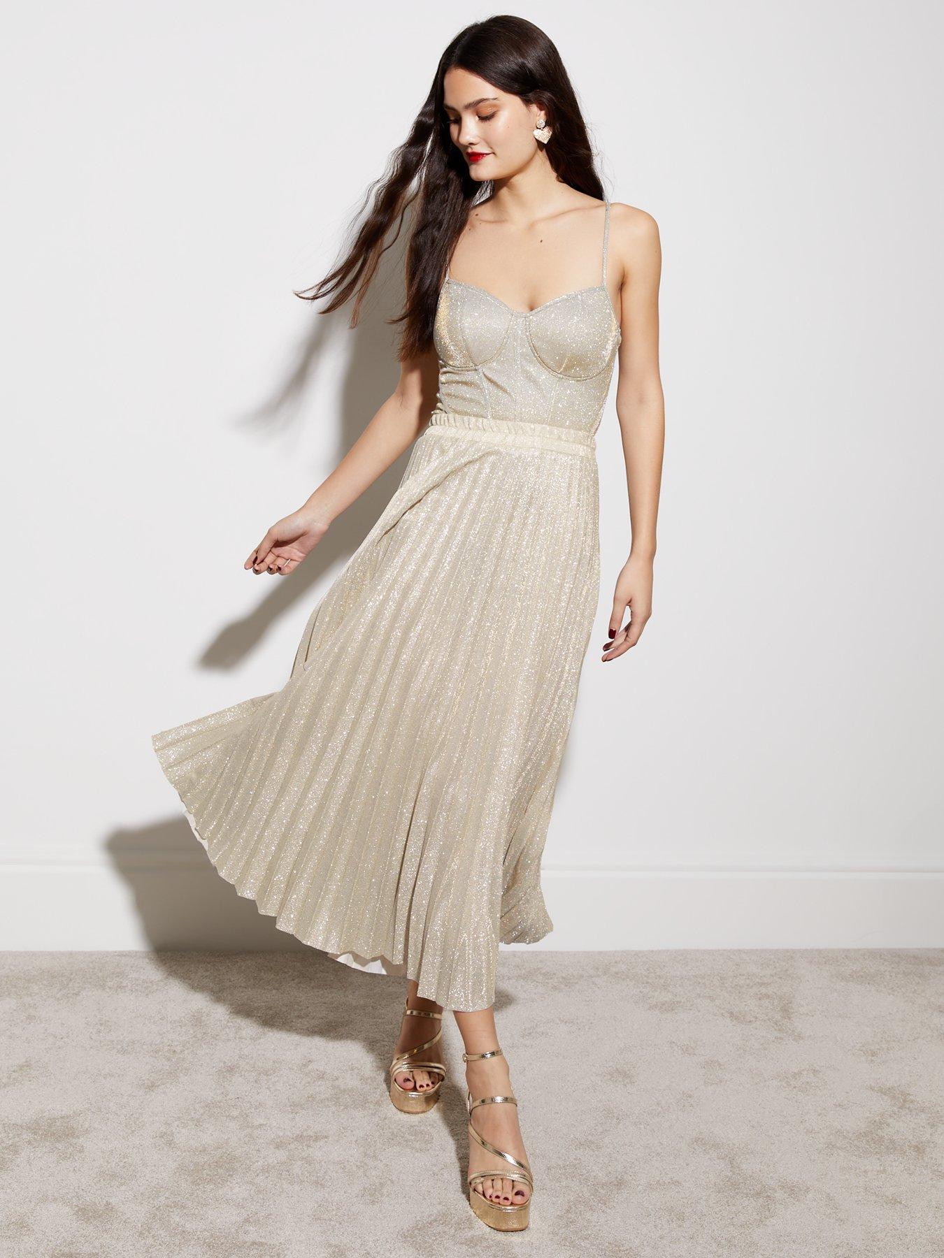 Gold shimmer pleated outlet skirt