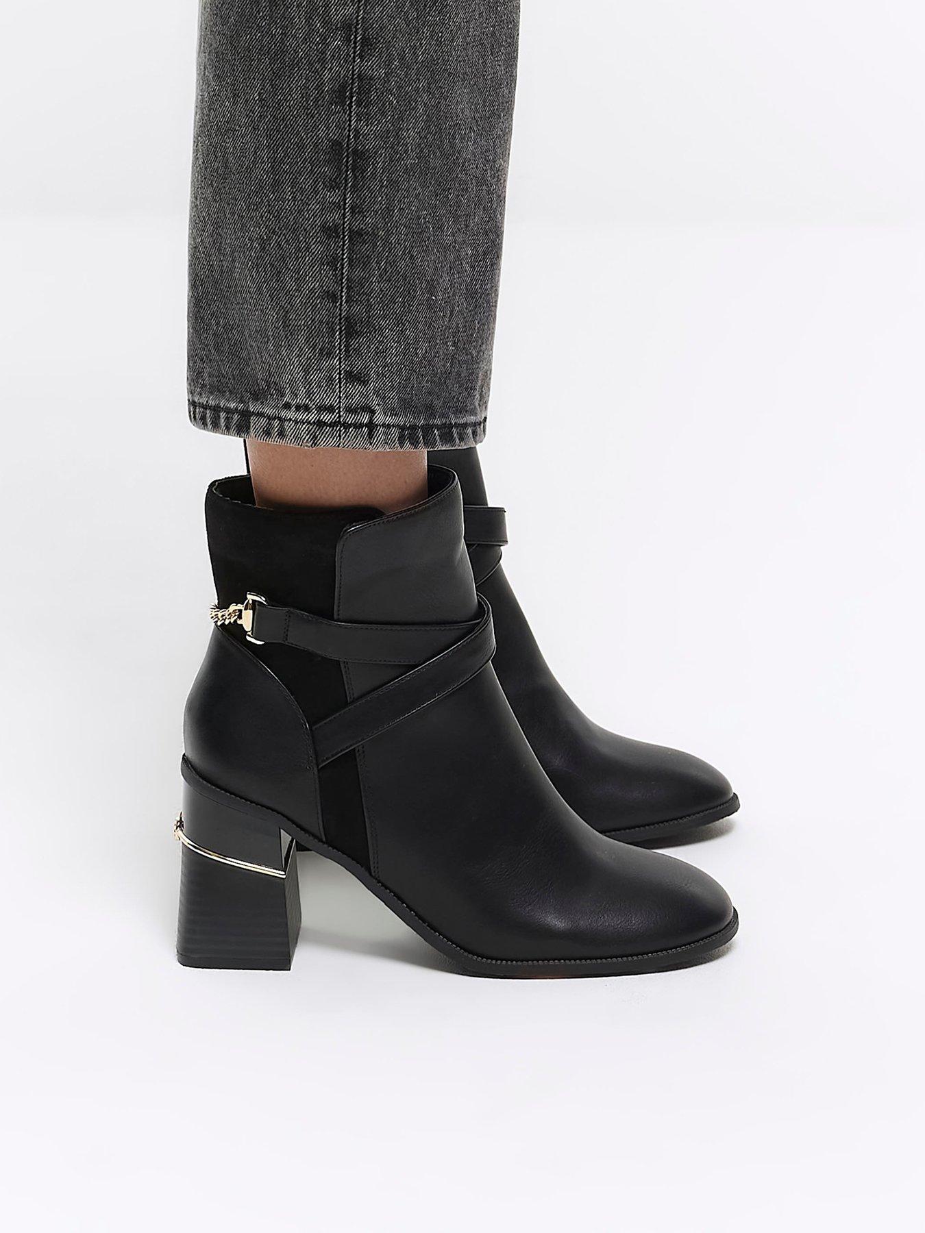 Black heeled hot sale boots sale