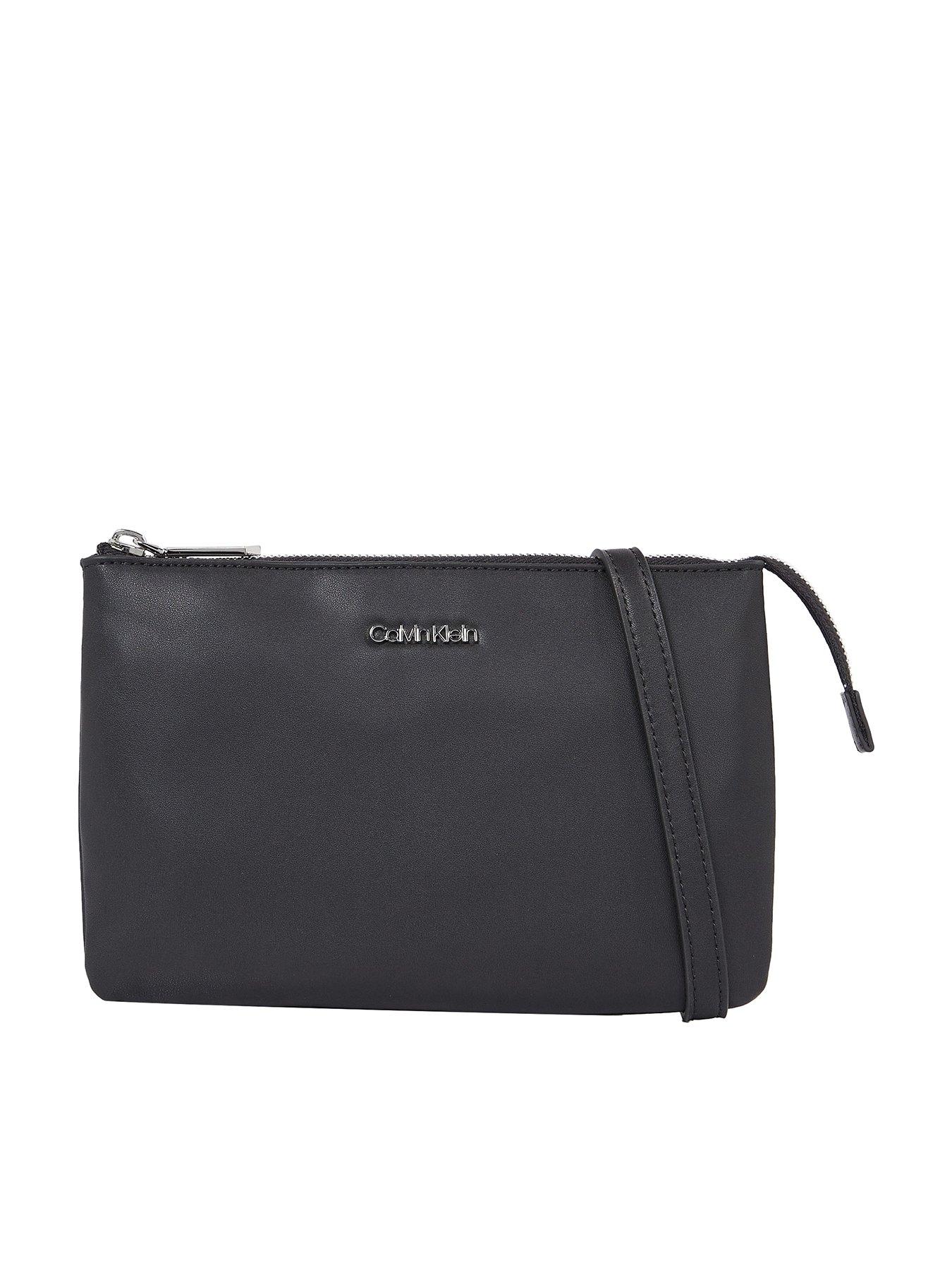 Calvin Klein Embossed monogram-pattern Crossbody Bag - Farfetch