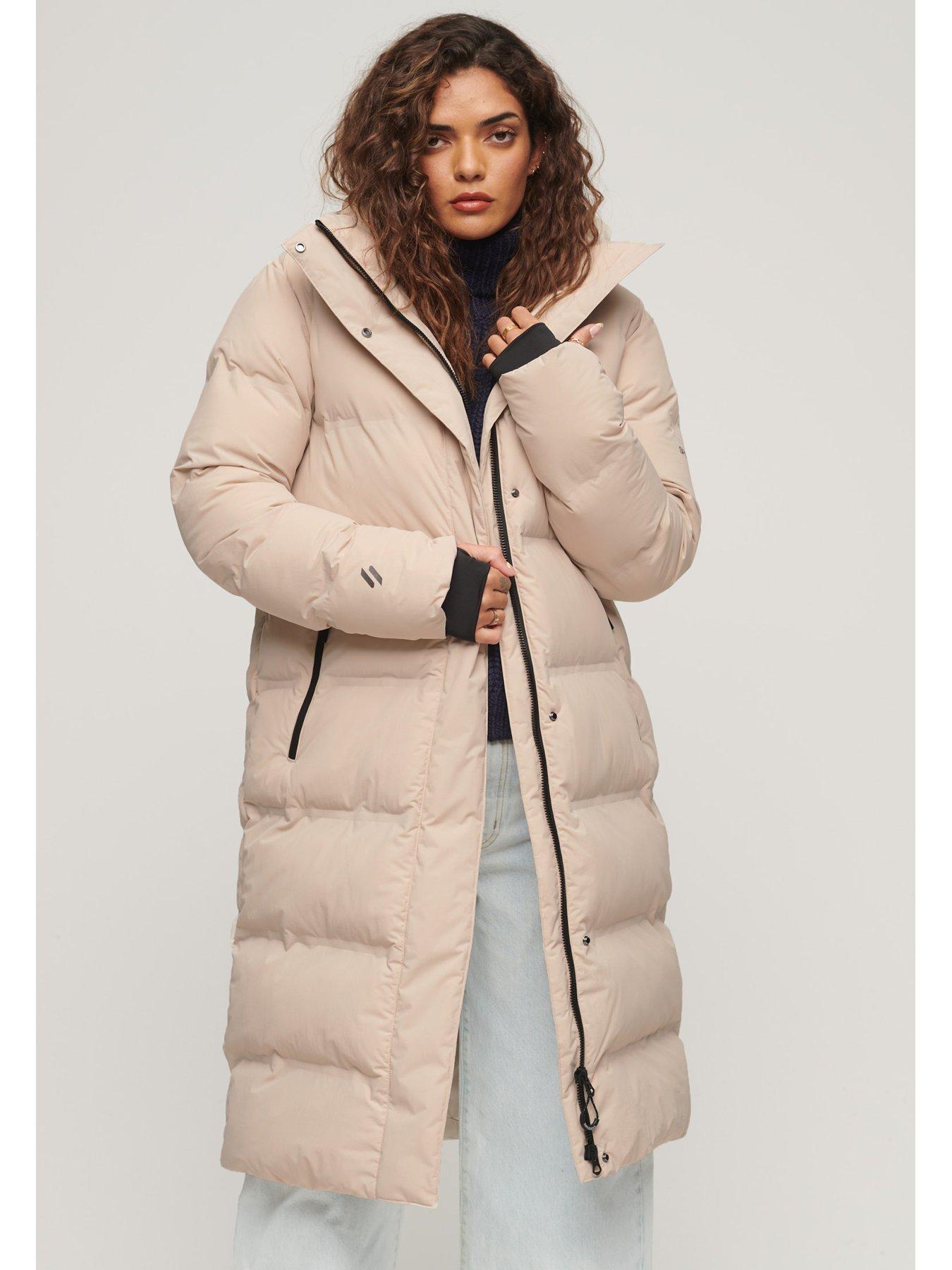 Beige longline store puffer coat