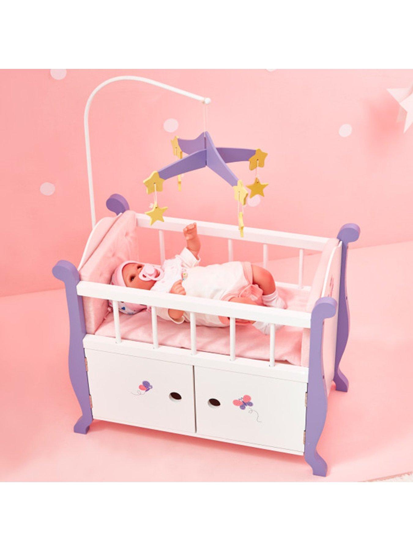 Doll crib outlet with storage