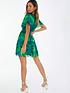  image of quiz-green-tropical-print-skater-dress