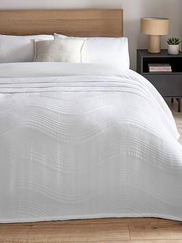 Product photograph of Very Home Quilted Wave Bedspread Throw - White from very.co.uk