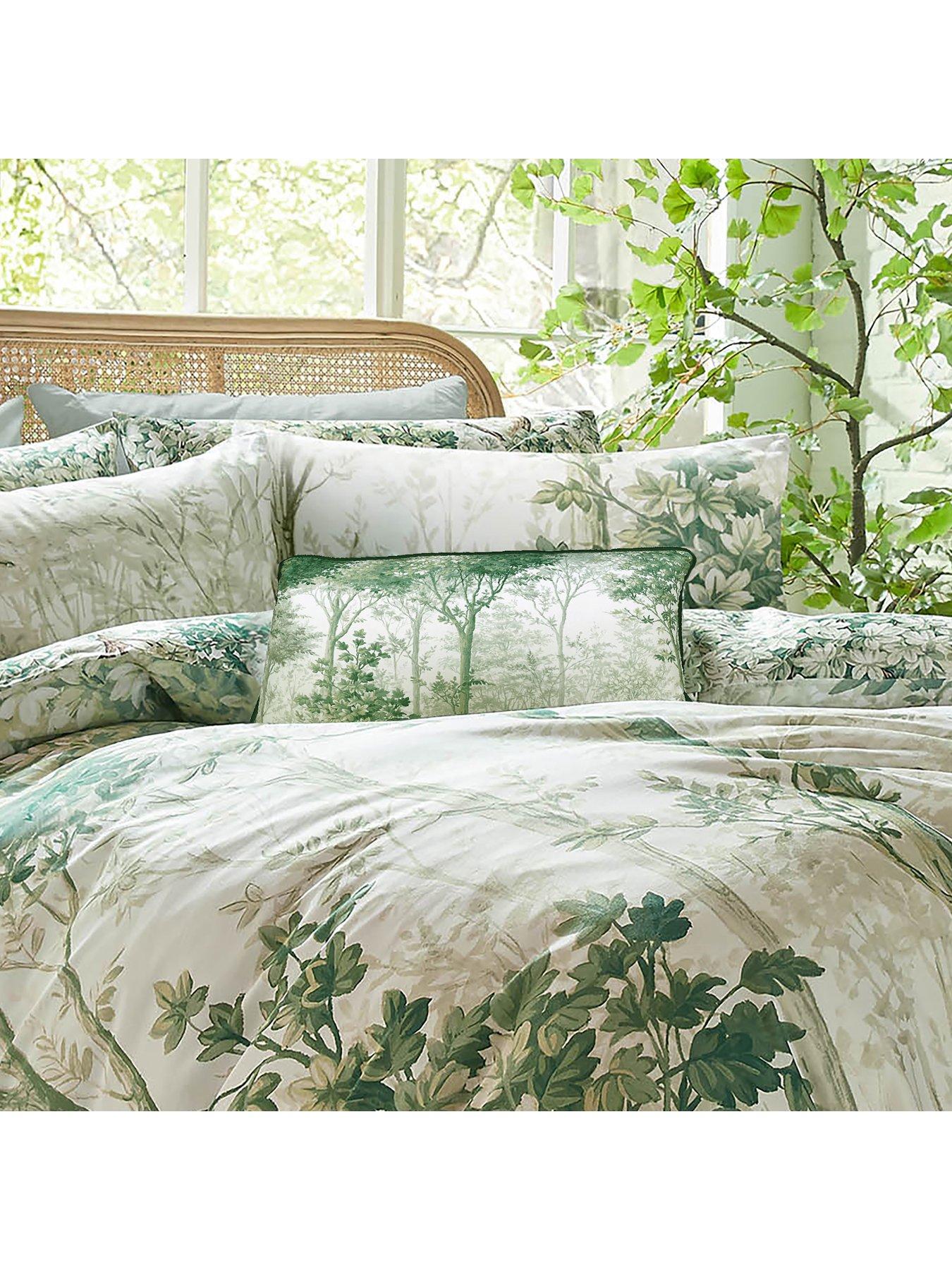 graham-brown-copice-forest-feather-filled-velvet-cushion