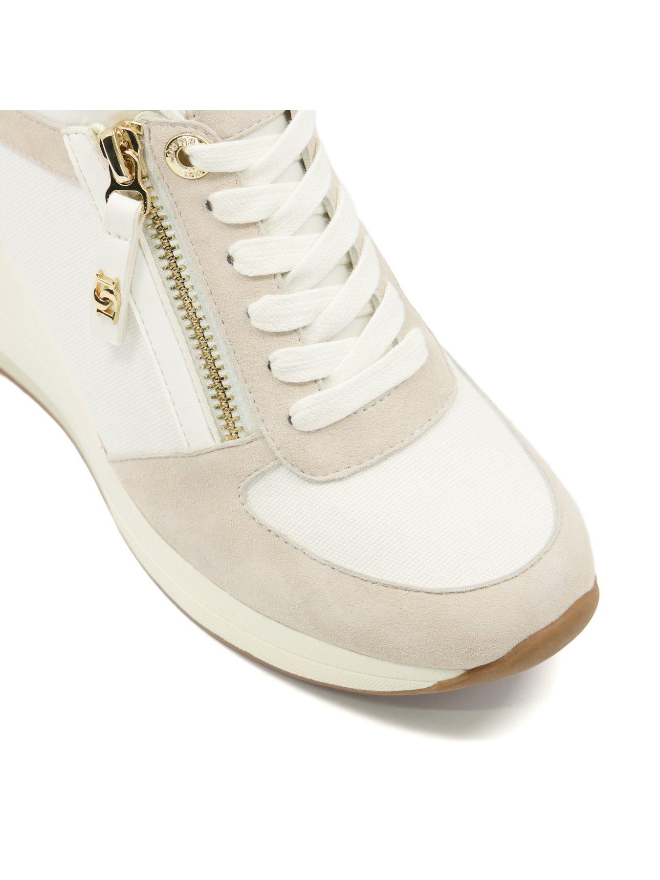 Cream wedge trainers store
