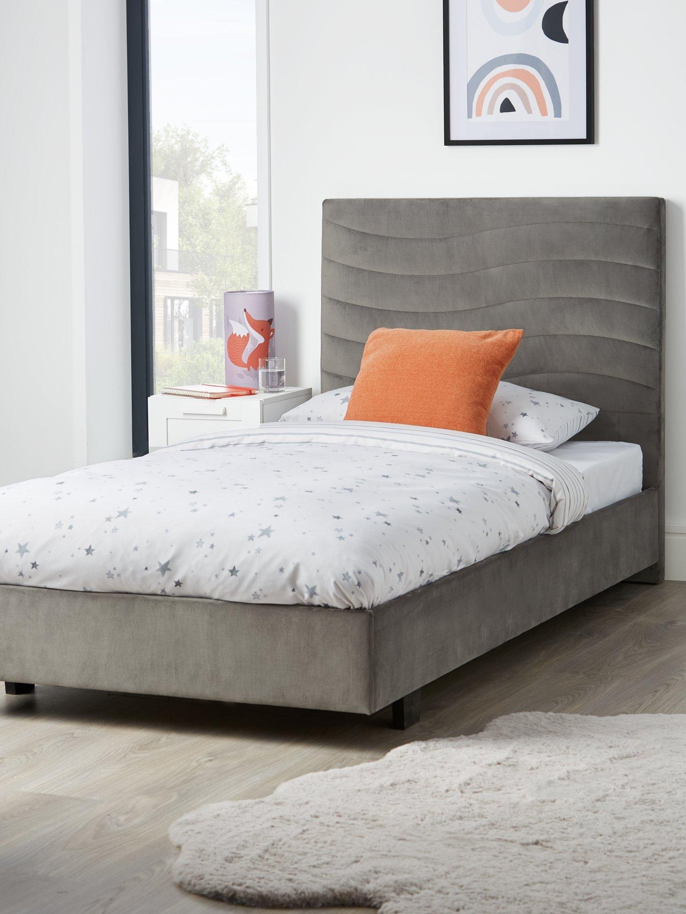 Mandarin upholstered single storage outlet bed