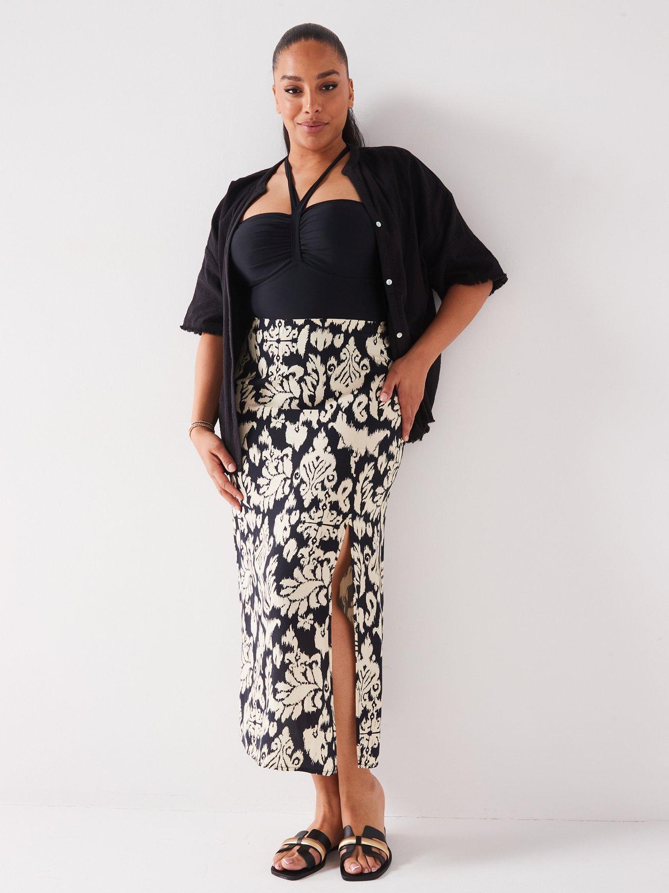 Deep V Sleeveless Fringed Midi Skirt
