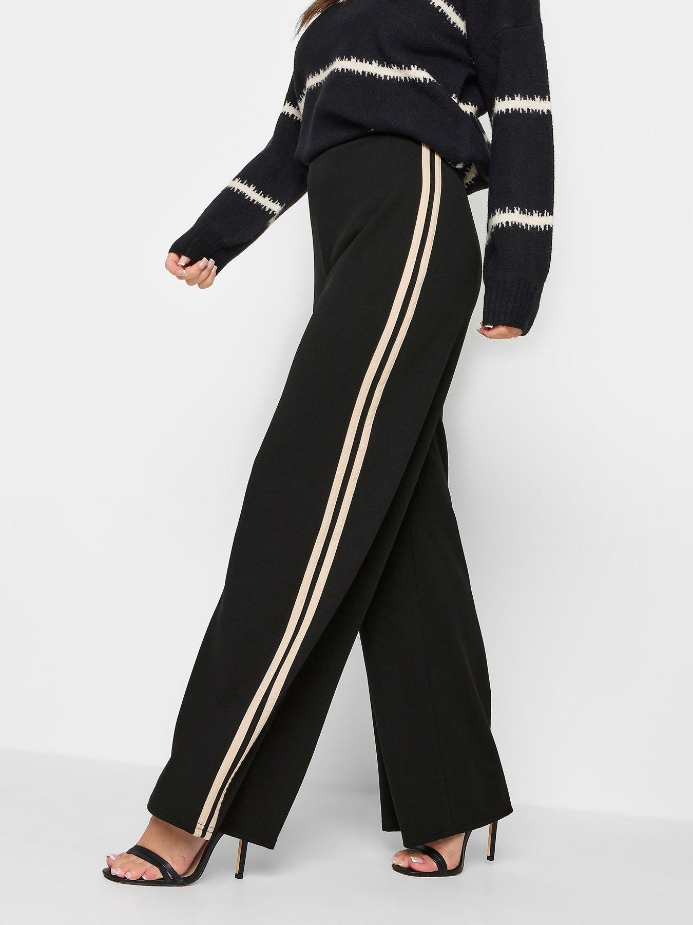 Black trousers with white stripe best sale