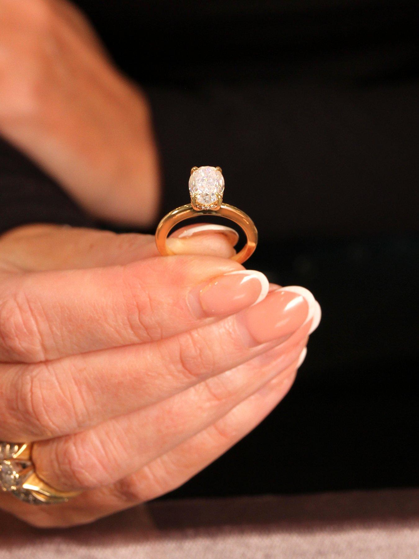Image 2 of 2 of Say It With Moissanite 2.00ct Oval Cut Hidden Halo 18ct Gold Band Ring