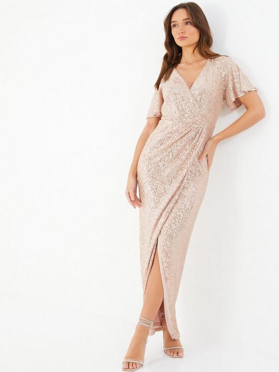 front image of quiz-champagne-sequin-wrap-maxi-dress
