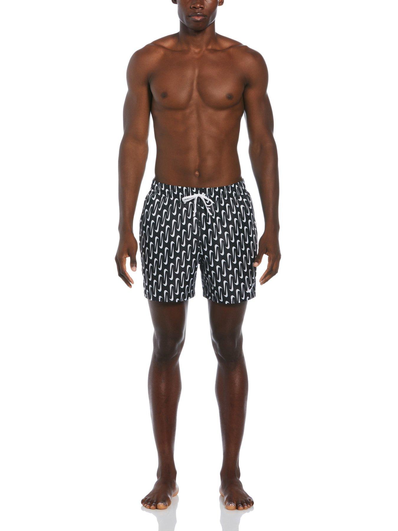 nike swimming 5inch volley shorts with all over swoosh print in black