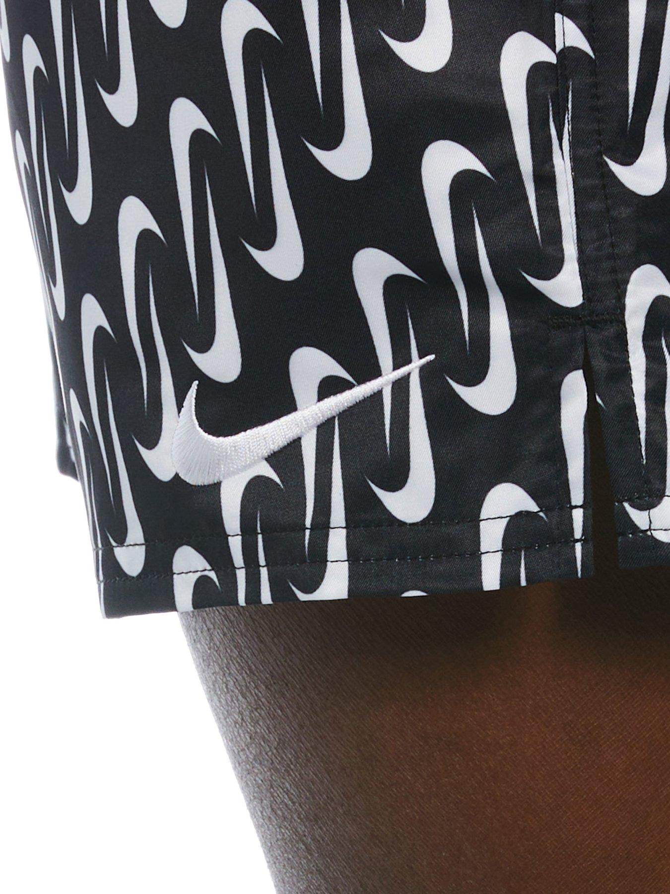 nike swimming 5inch volley shorts with all over swoosh print in black