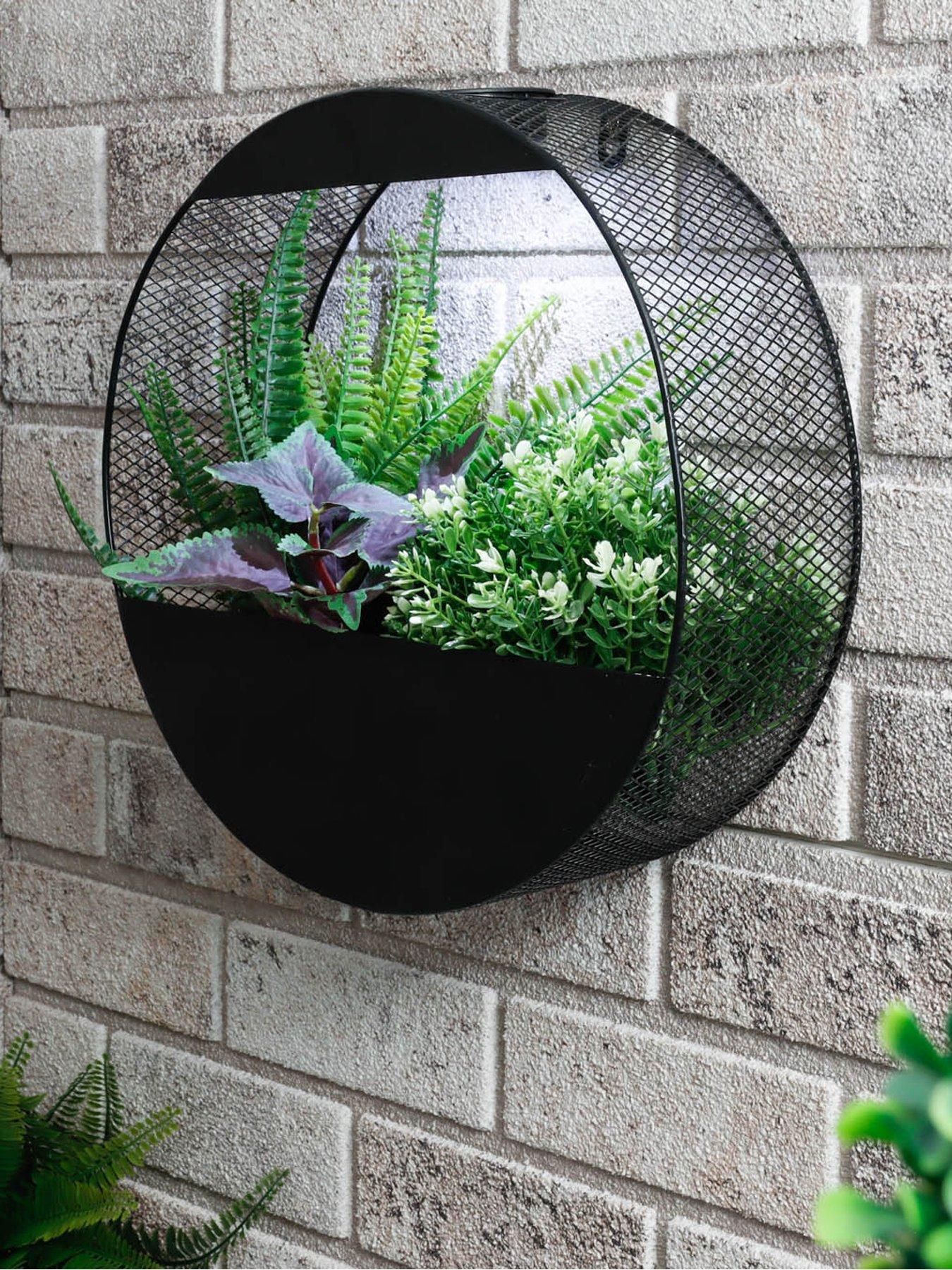 Product photograph of Streetwize Circular Solar Wall Planter from very.co.uk