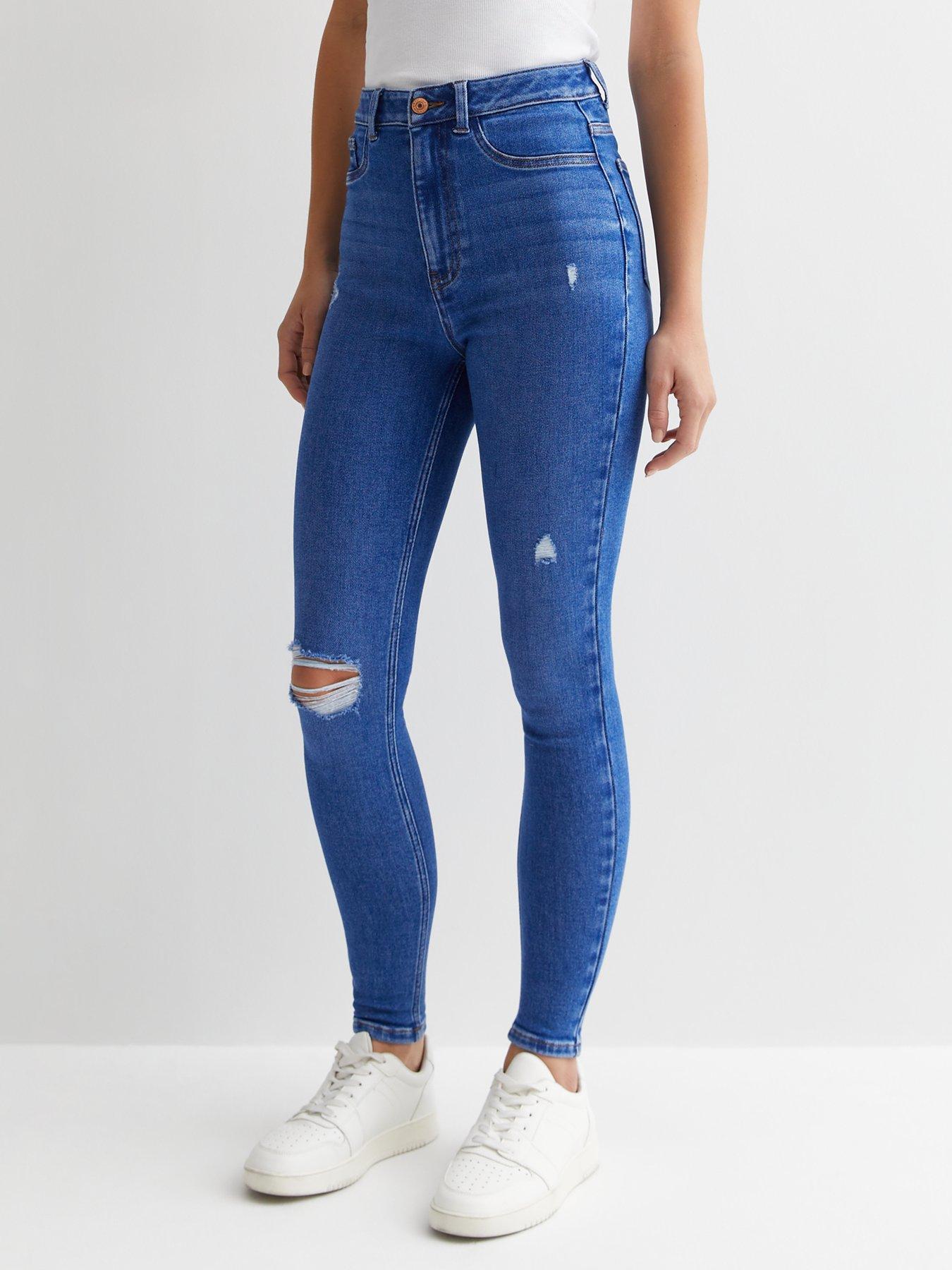 High waisted store ripped knee jeans