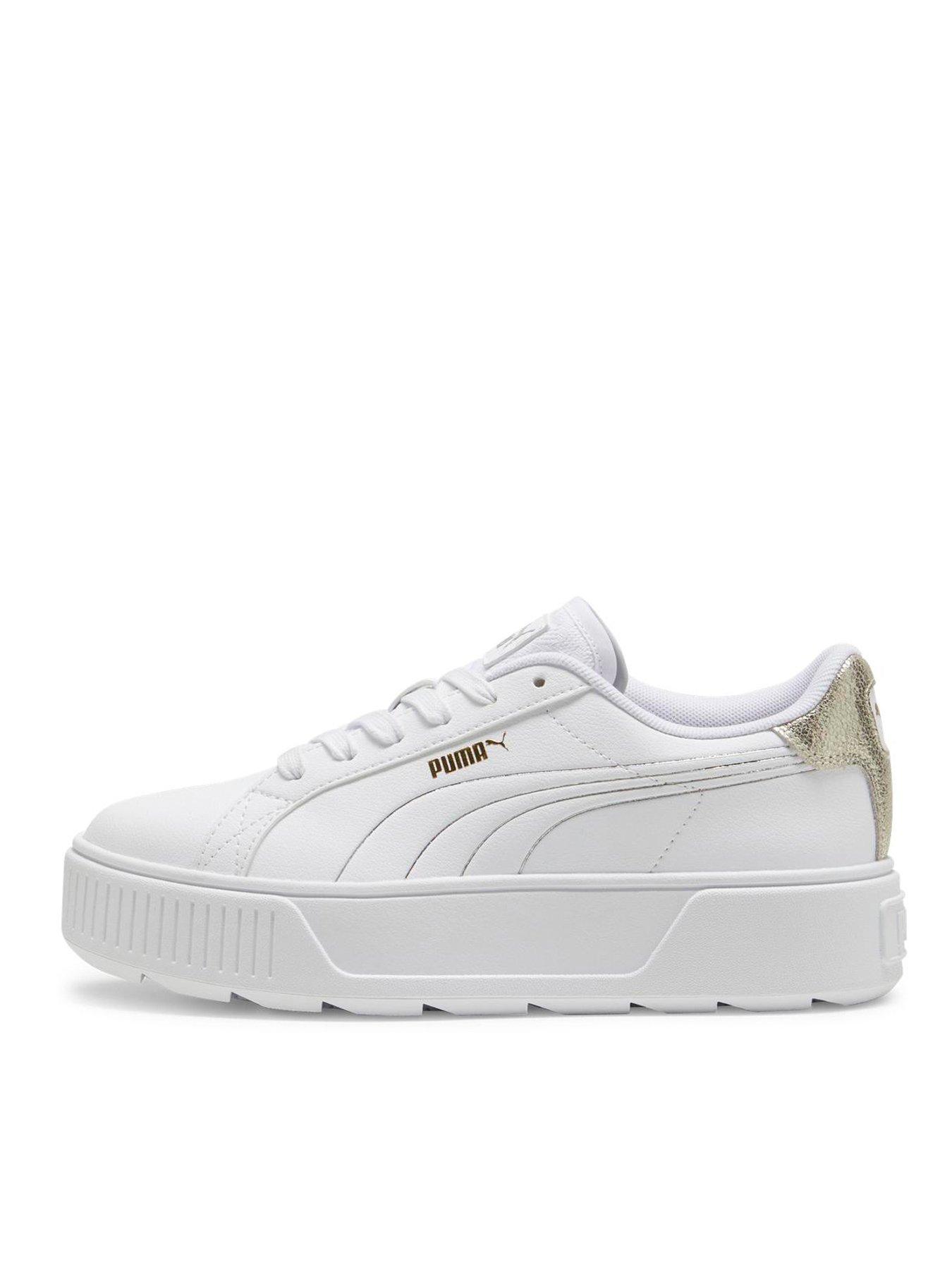 White puma trainers store womens