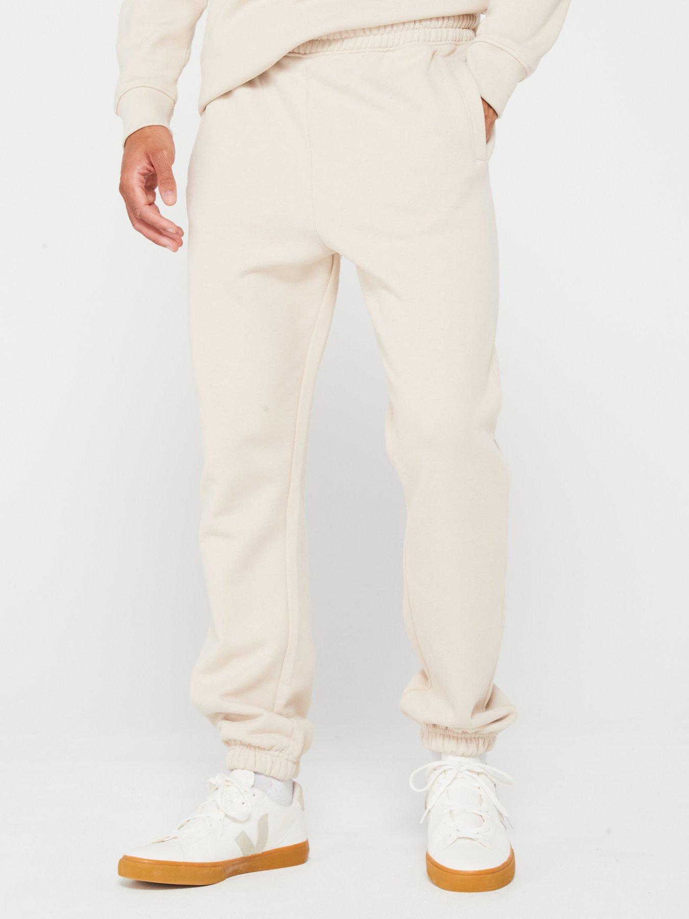 Cream jogging bottoms online