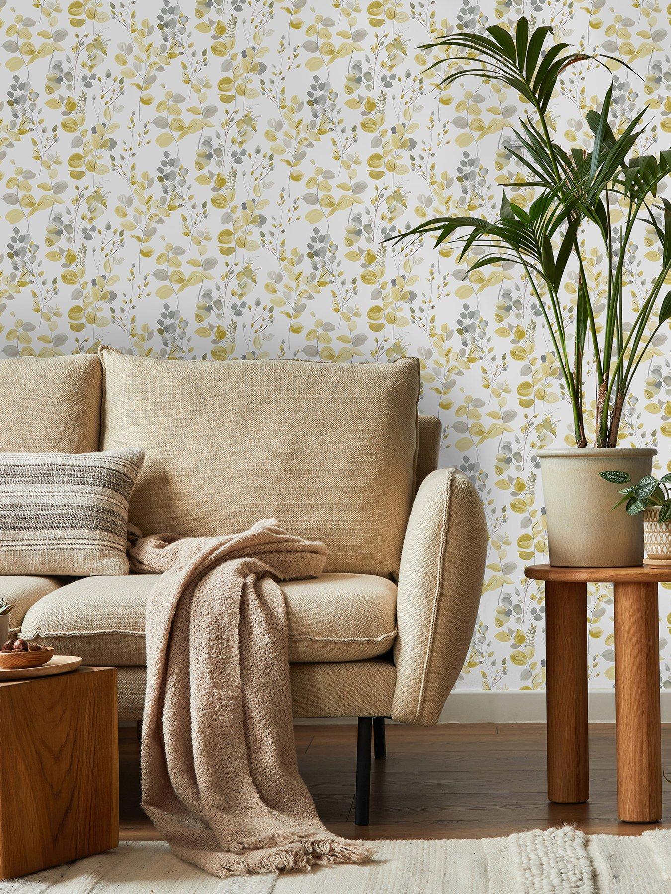 Product photograph of Fresco Watercolour Leaves Ochre Wallpaper from very.co.uk