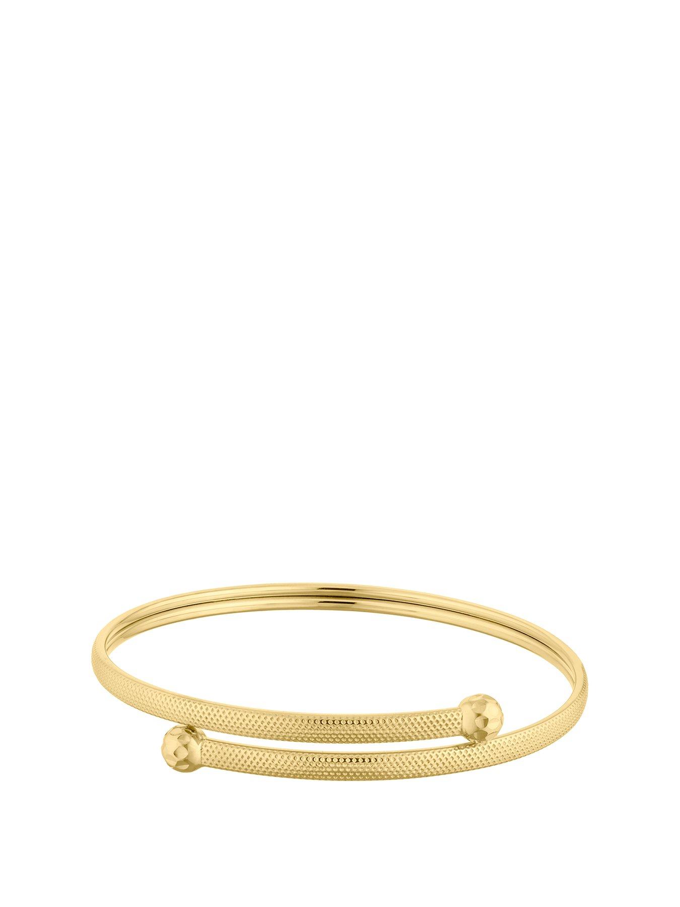 Product photograph of Ernest Jones 9ct Yellow Gold Torque Flexible Bangle from very.co.uk