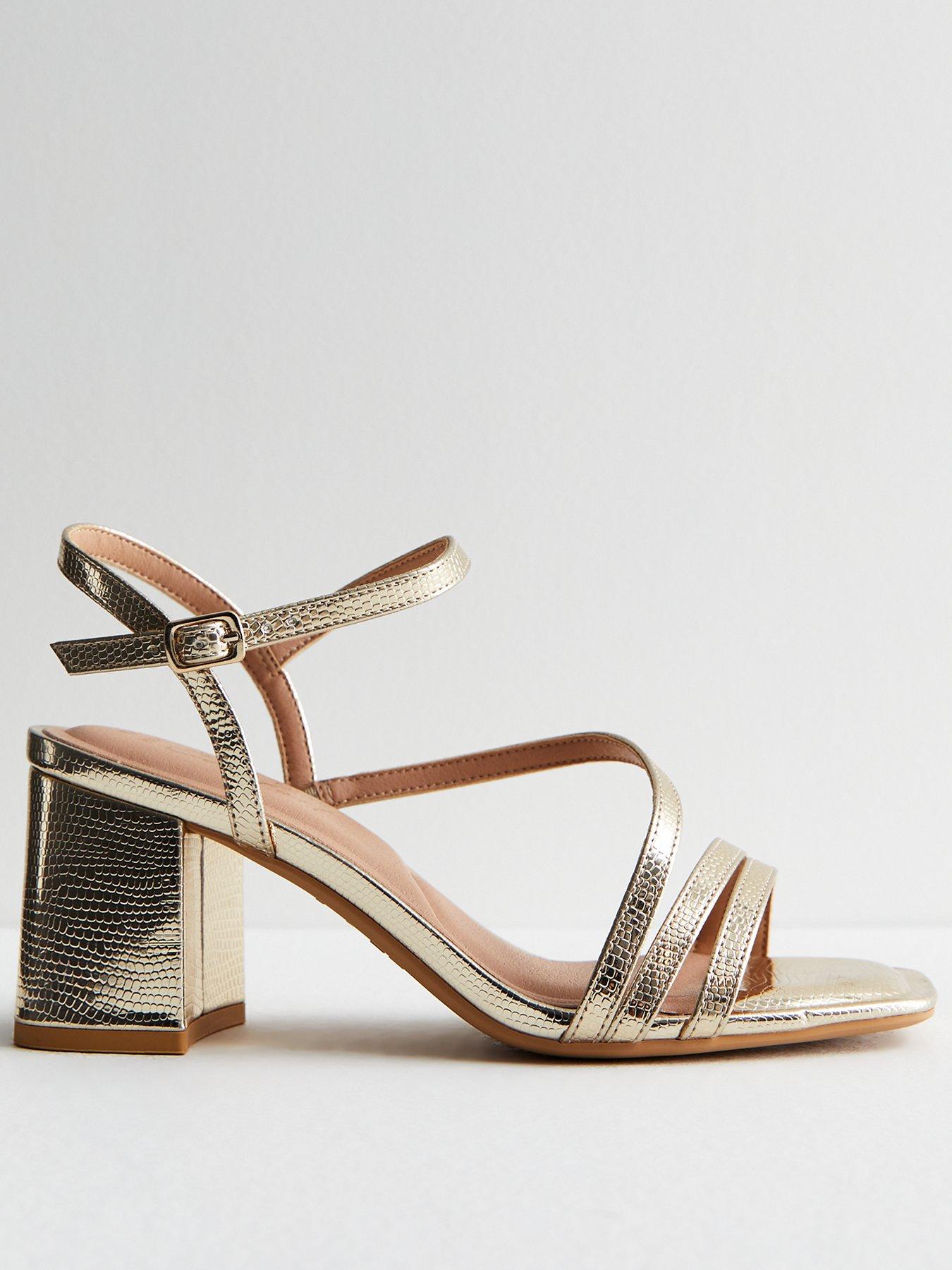 Strappy lady sandals in metallic gold Womens sandals Strappy block heel sandals