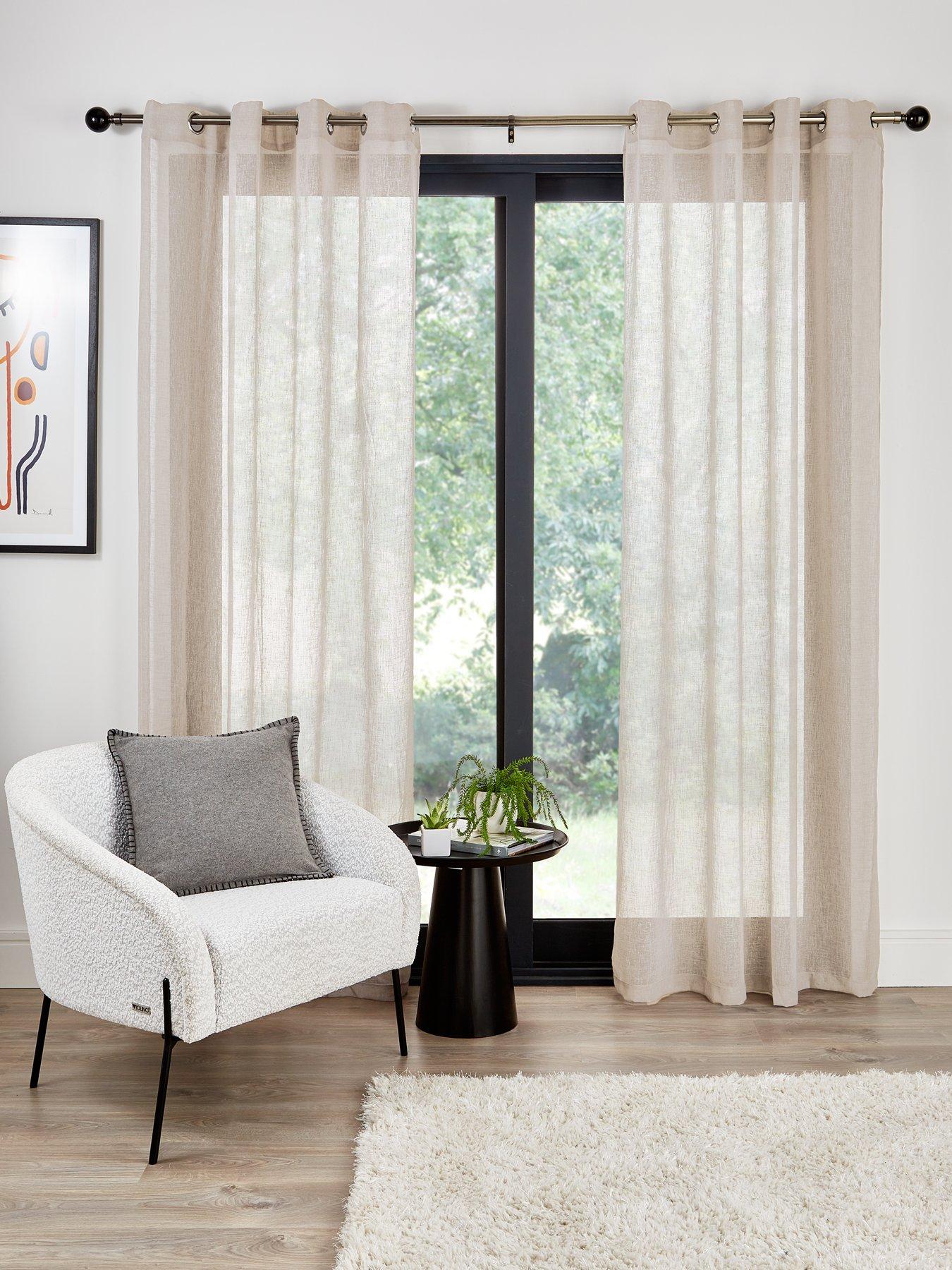 Product photograph of Very Home Kos Textured Eyelet Voile Curtains from very.co.uk