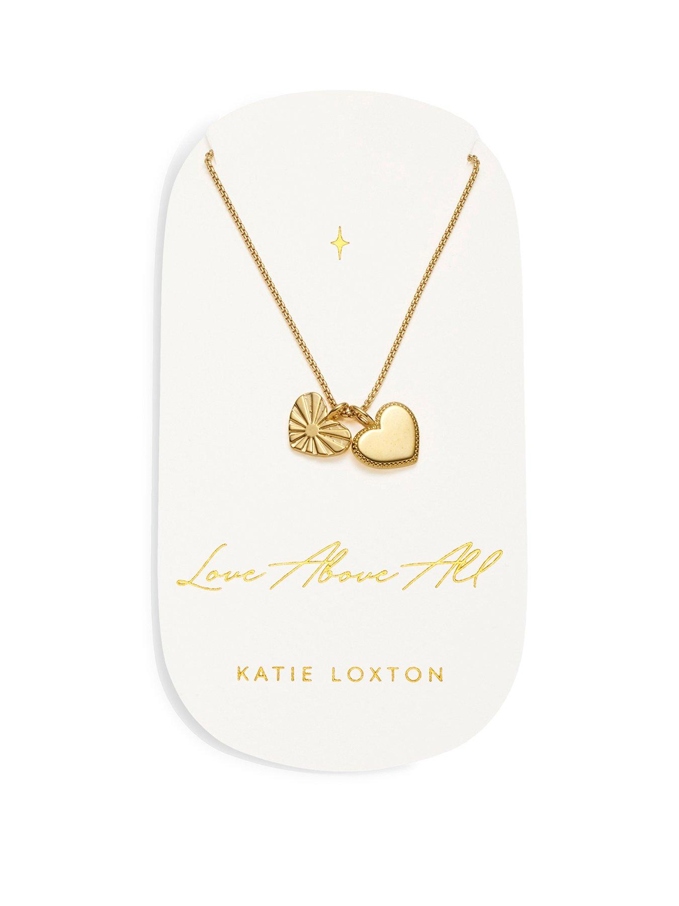 Product photograph of Katie Loxton Love Above All Waterproof Gold Charm Necklace from very.co.uk