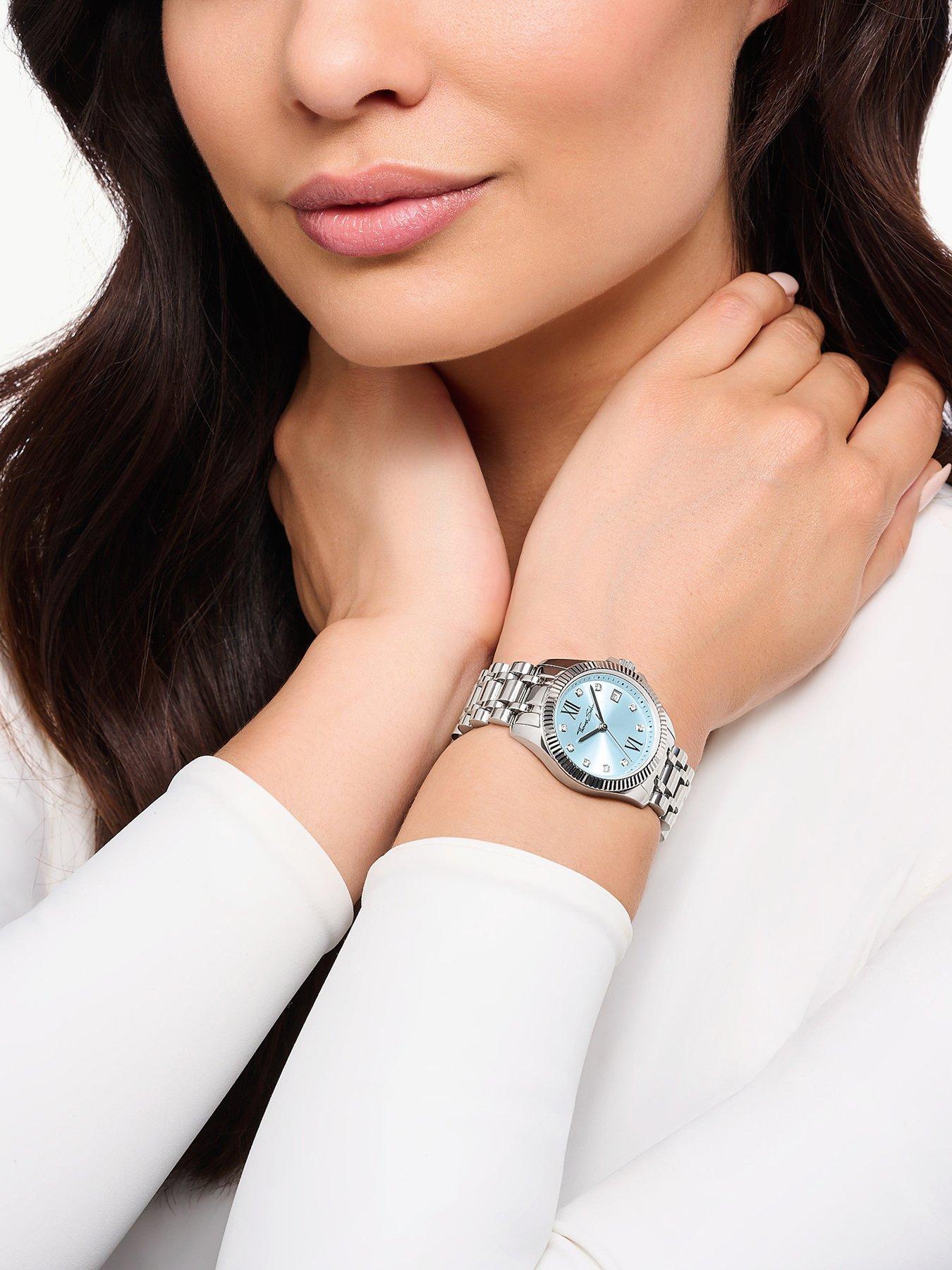 Image 3 of 5 of Thomas Sabo Women's Watch: Elegant light blue dial, white zirconia indexes, Roman numerals, fluted bezel, TS logo crown. Adjustable