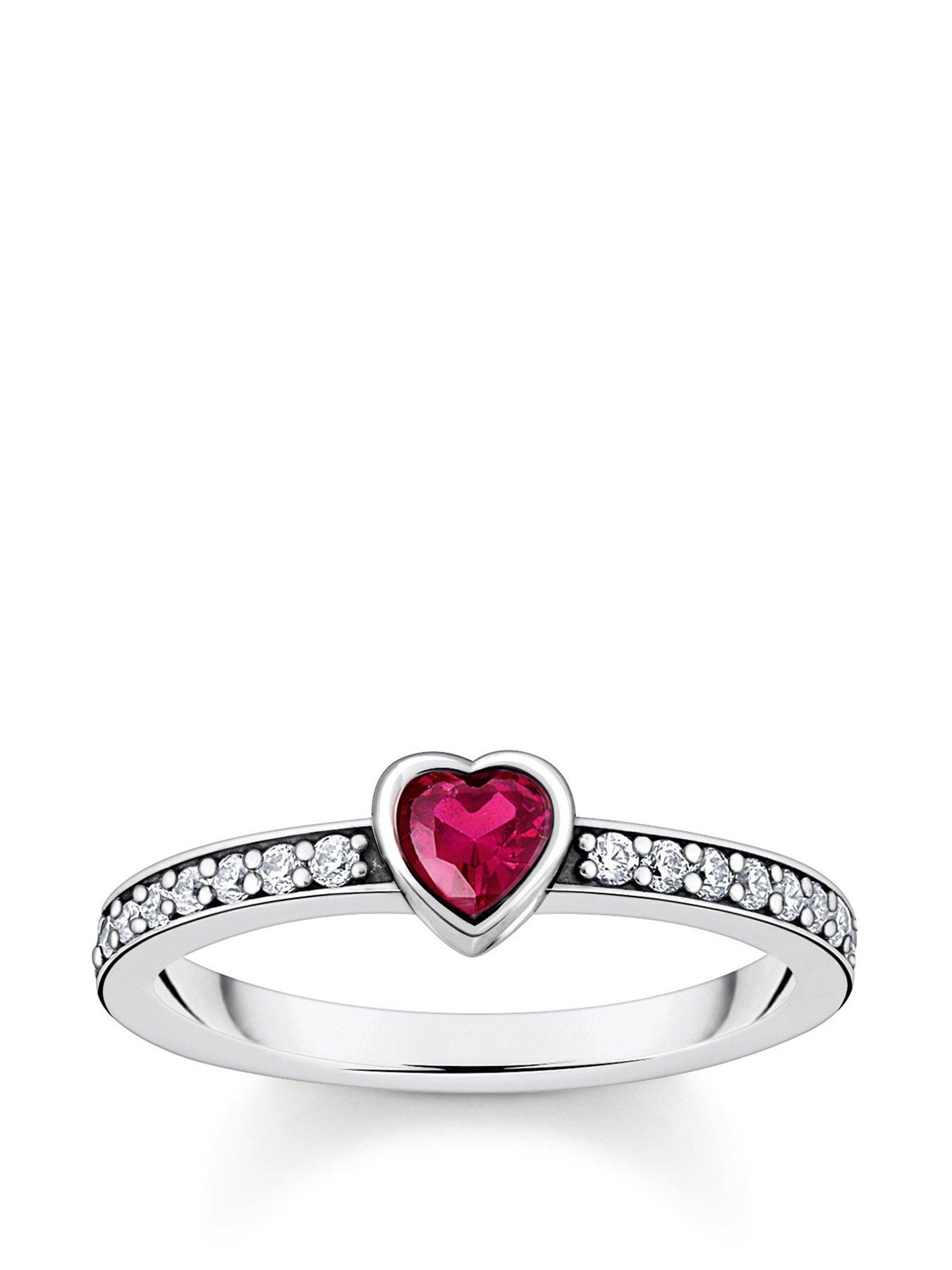 Thomas Sabo Solitaire Heart Ring: Sparkling romance with red heart-cut stone, white zirconia band, FOLLOW YOUR HEART engraving