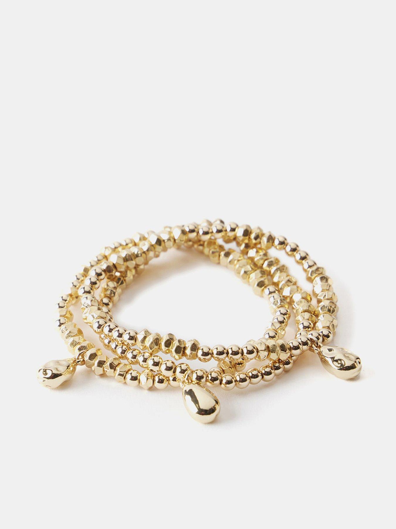 Product photograph of Mint Velvet Gold Friendship Bracelet from very.co.uk