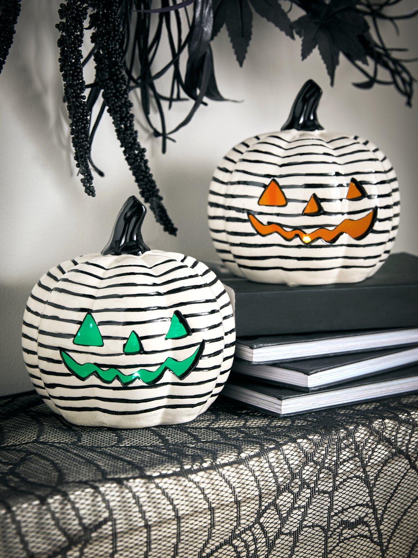 Product photograph of Very Home Set Of 2 Light-up Striped Ceramic Pumpkin Decorations from very.co.uk