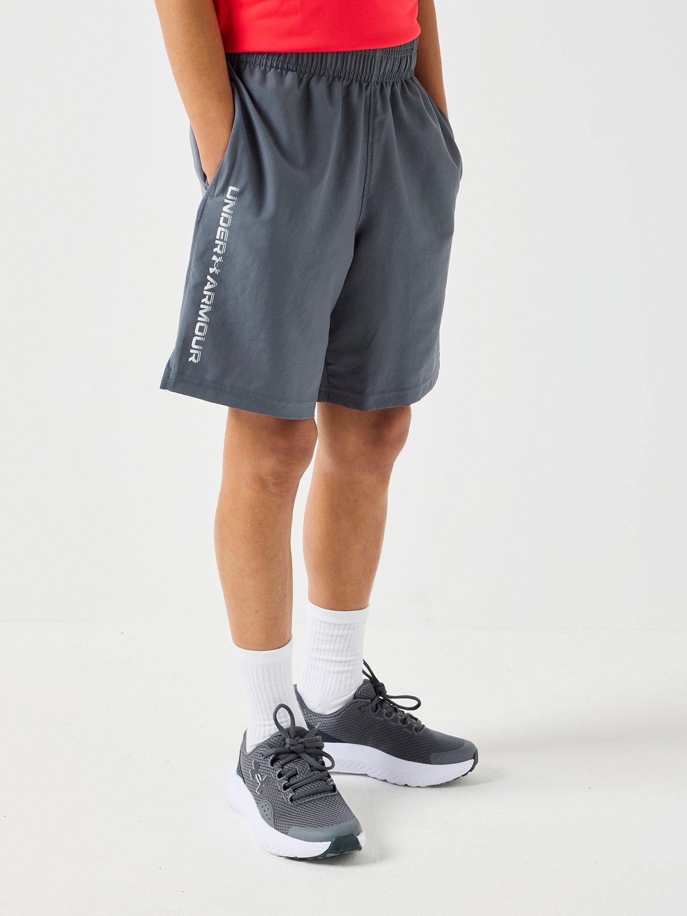 Image 1 of 6 of UNDER ARMOUR Boys Training Woven Wordmark Shorts -&nbsp;Grey