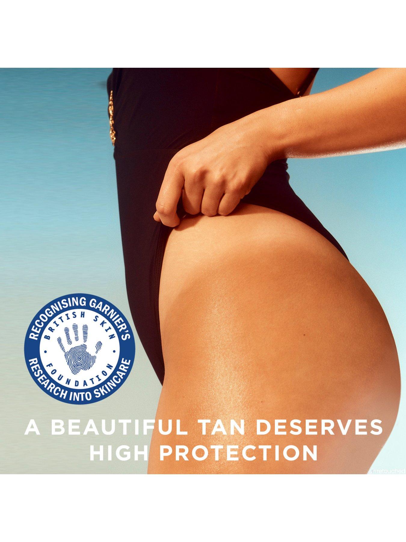 Image 3 of 6 of Garnier Ambre Solaire Ideal Bronze Protective Oil Sun Cream Spray SPF15 150ml