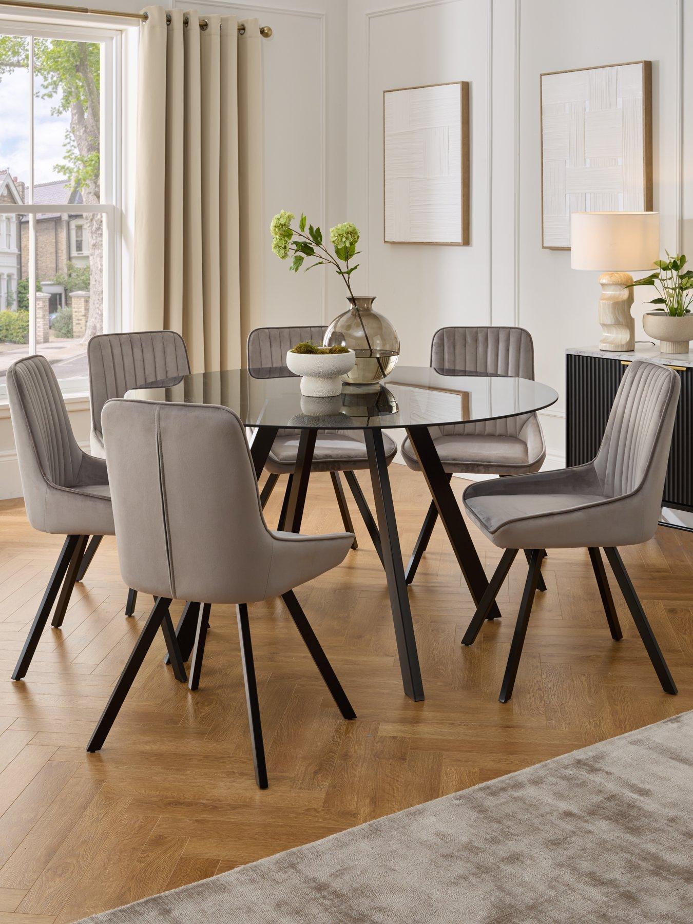 undefined Marlow 130 cm Round Smoked Glass Top Dining Table and 6 Fabric Chairs - Grey/Black