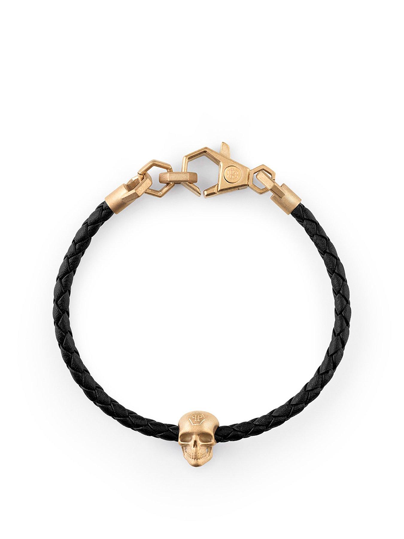 Product photograph of Philipp Plein Friendship Skull Ip Yellow Gold Black Leather Bracelet from very.co.uk