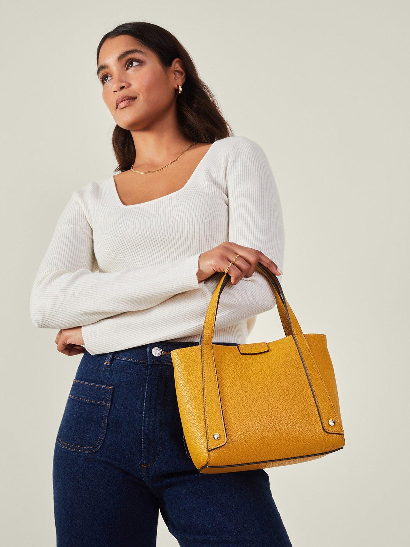 Image 2 of 4 of Accessorize Evie Small Handheld