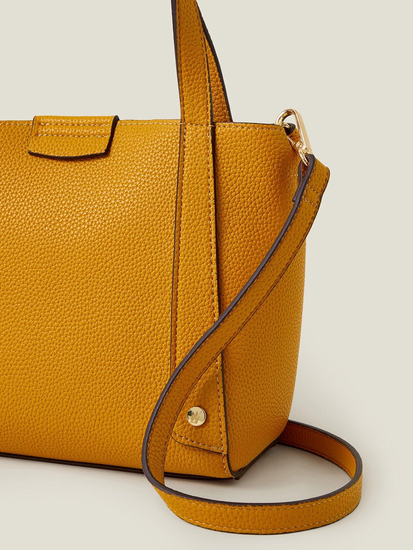 Image 4 of 4 of Accessorize Evie Small Handheld