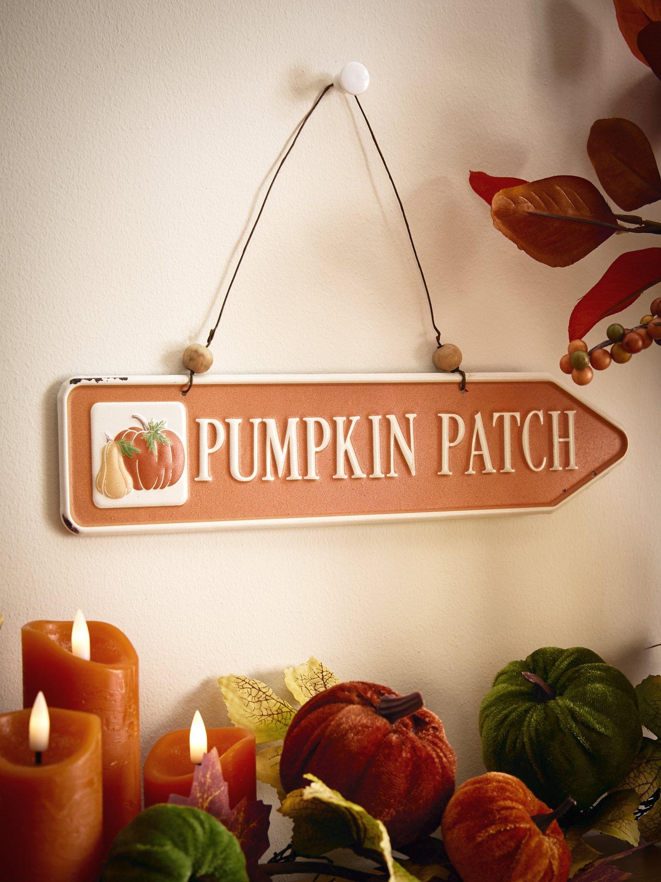 Product photograph of Festive Metal Pumpkin Patch Sign Halloween Decoration from very.co.uk