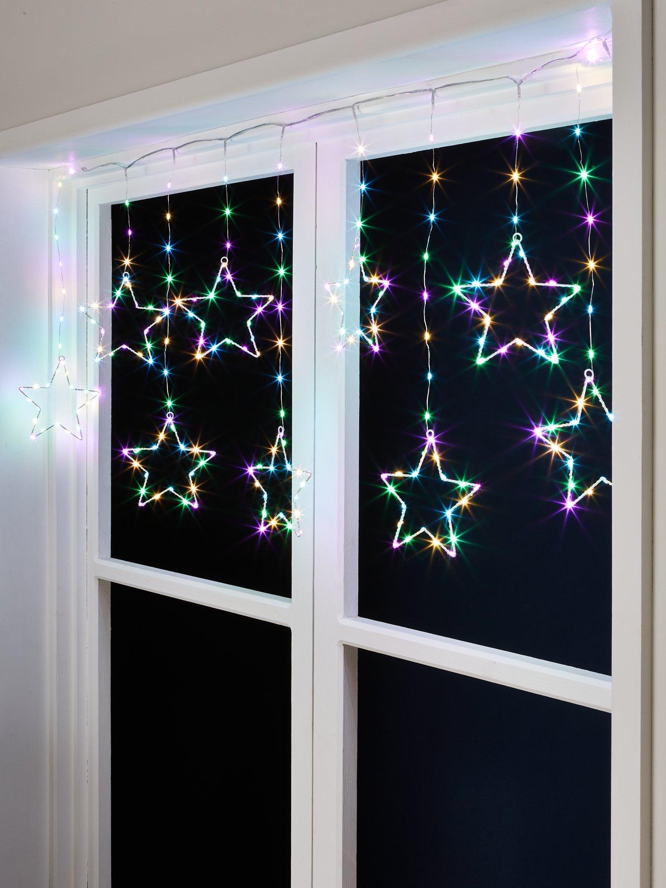 Product photograph of Festive Aurora Star Curtain Christmas Light from very.co.uk