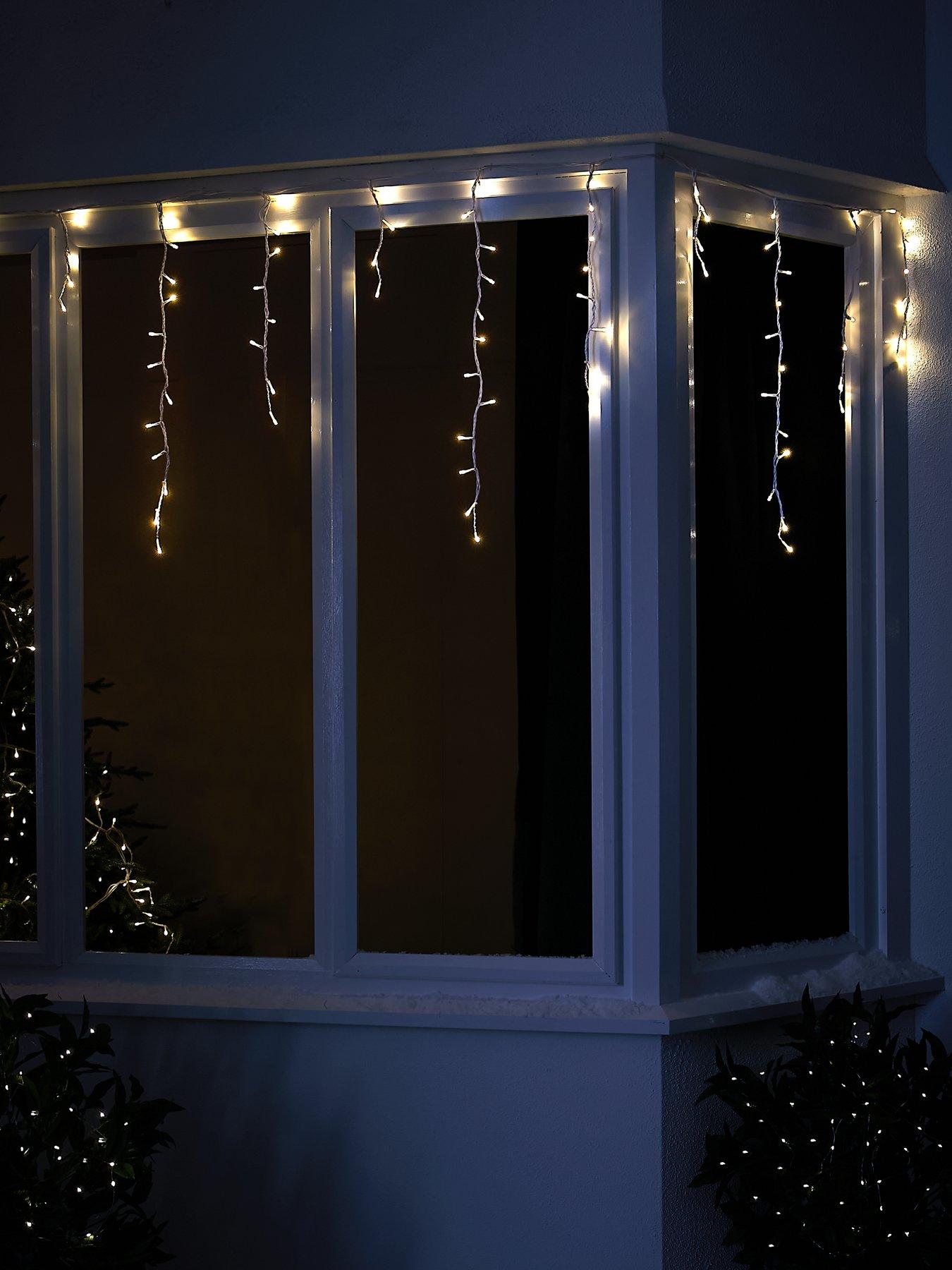 Product photograph of Festive 480 Warm White Led Snowing Icicle Outdoor Christmas Lights from very.co.uk