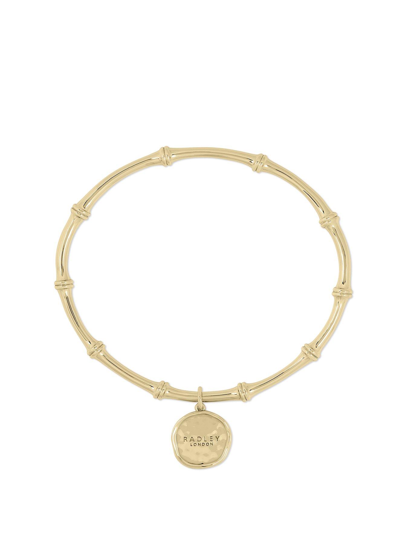Product photograph of Radley 18ct Pale Gold Plated Bamboo Bangle from very.co.uk