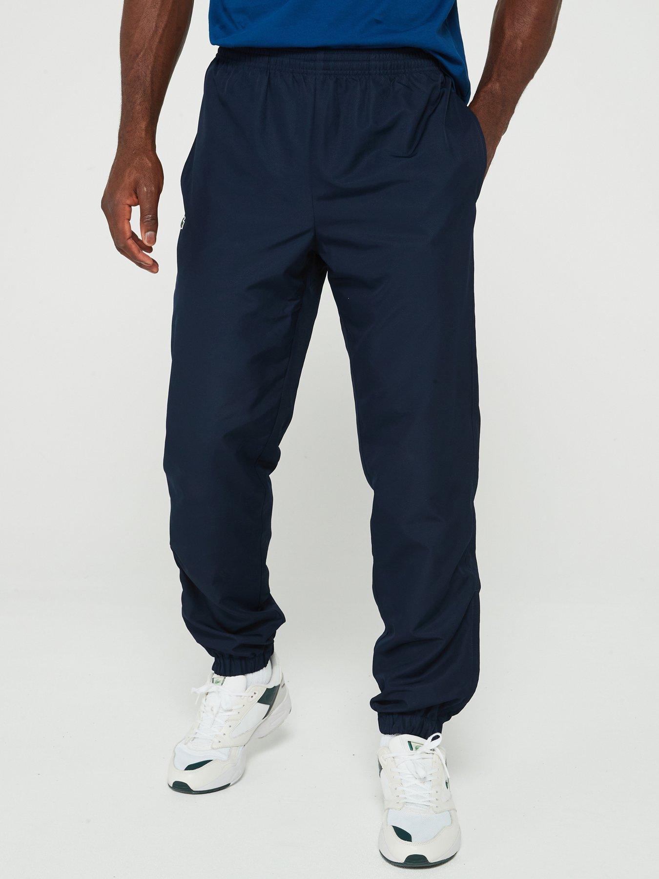 Blue lacoste joggers best sale