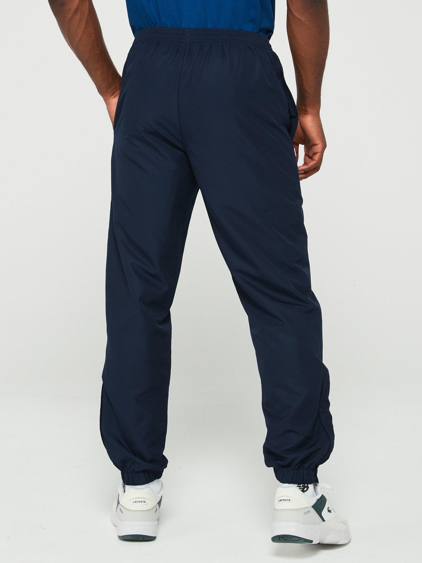 Blue lacoste guppy pants best sale